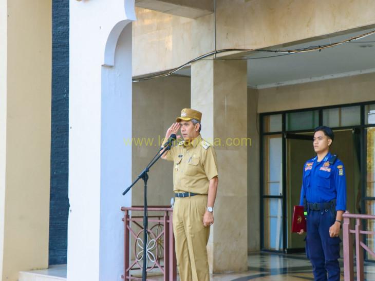 Pj Bupati Pimpin Apel Gabungan di Lapangan Kantor Bupati Kampar.